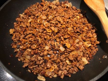 A picture containing black, plant, pan, kitchenware Description automatically generated