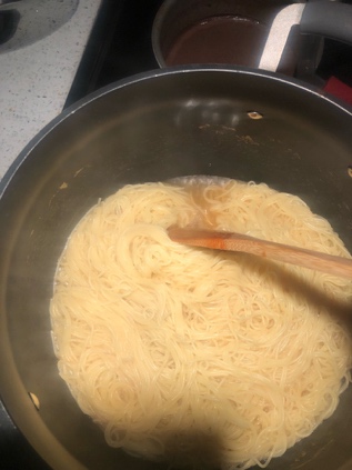 A picture containing food, indoor, bowl, pan Description automatically generated