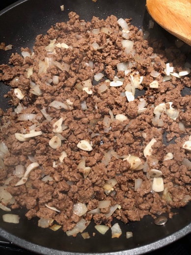 A picture containing food, indoor, pan, plant Description automatically generated