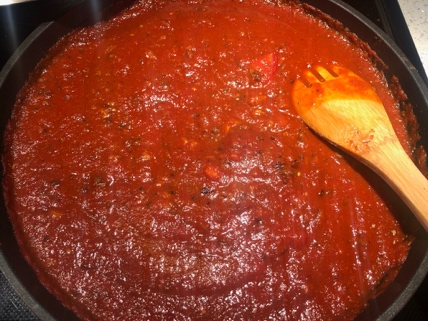 A picture containing indoor, food, sauce, pan Description automatically generated